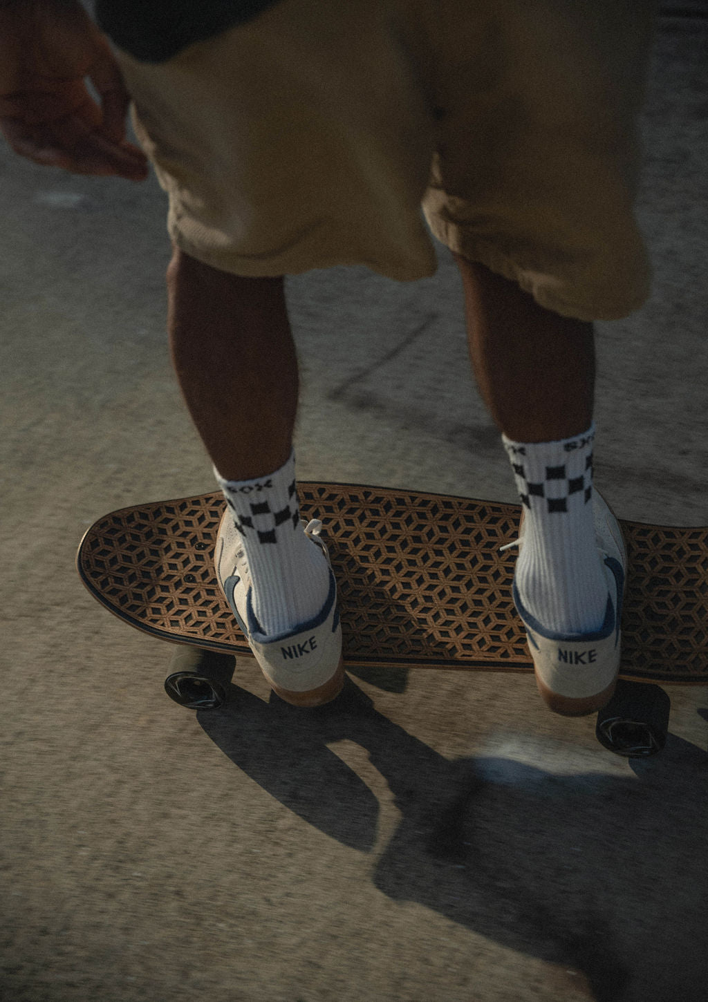 Man Standing on Skateboard